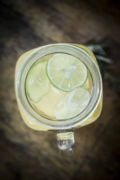 Glass of refreshing lemonade — Stock Photo, Image