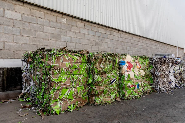 Bales of leftover paper for recycling. Printing processes industry