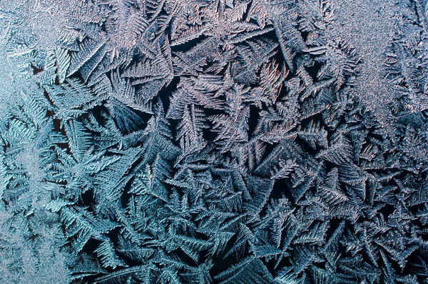 Winter background.Frost on the window. — Stock Photo, Image