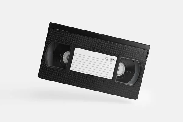 Κασέτα VHS στον αέρα πάνω από το λευκό φόντο — Φωτογραφία Αρχείου