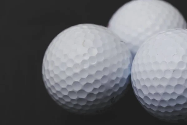 Weinig Golfballen Een Zwarte Achtergrond — Stockfoto