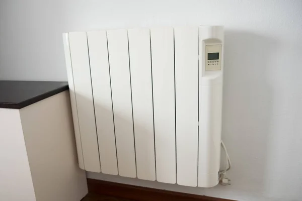 Close White Electric Radiator Winter Heating Energy Saving Stock Photo