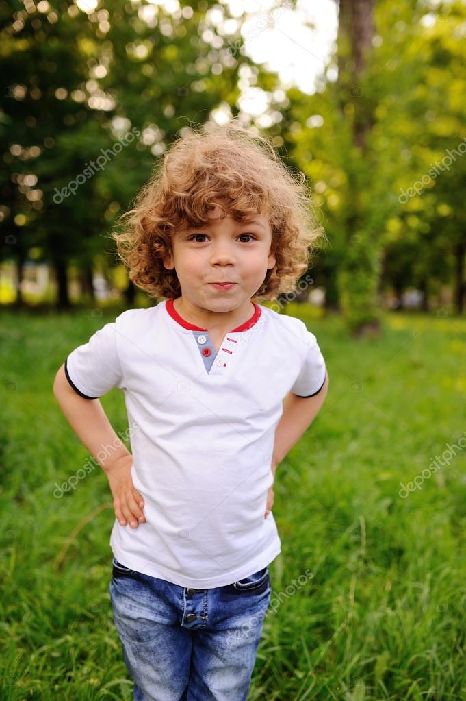 Cute Baby Boy With Curly Hair Baby Boy With Curly Hair Against A