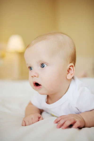 Baby boy lying on the bed — Stock Photo, Image