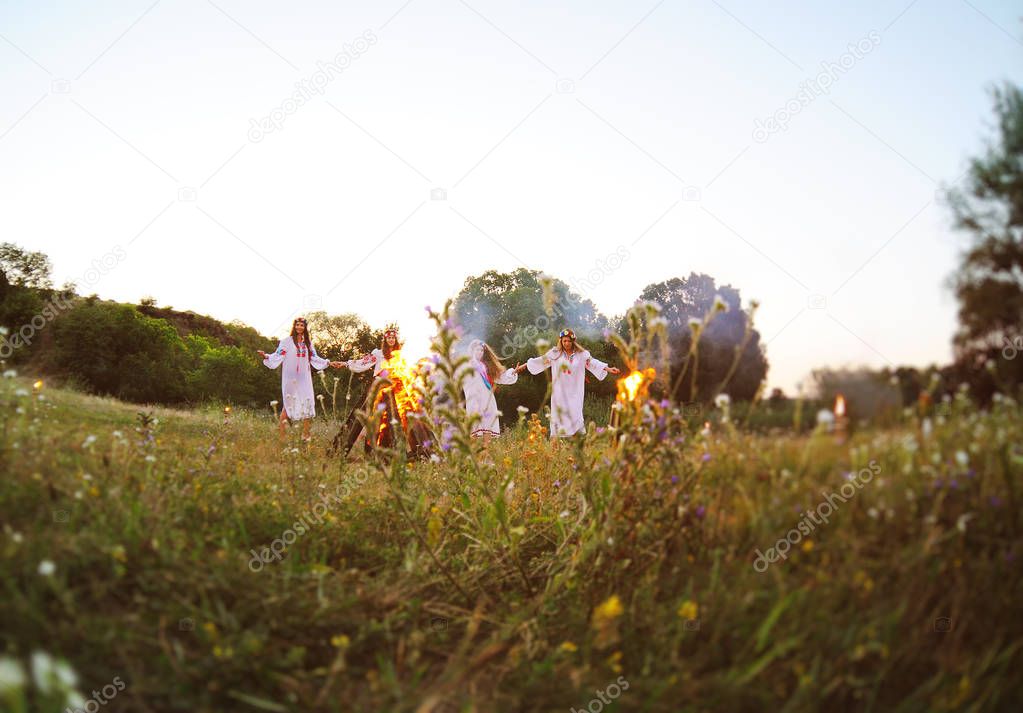 The celebration of the pagan Slavic holiday of Ivan Kupala Day or Midsummer.