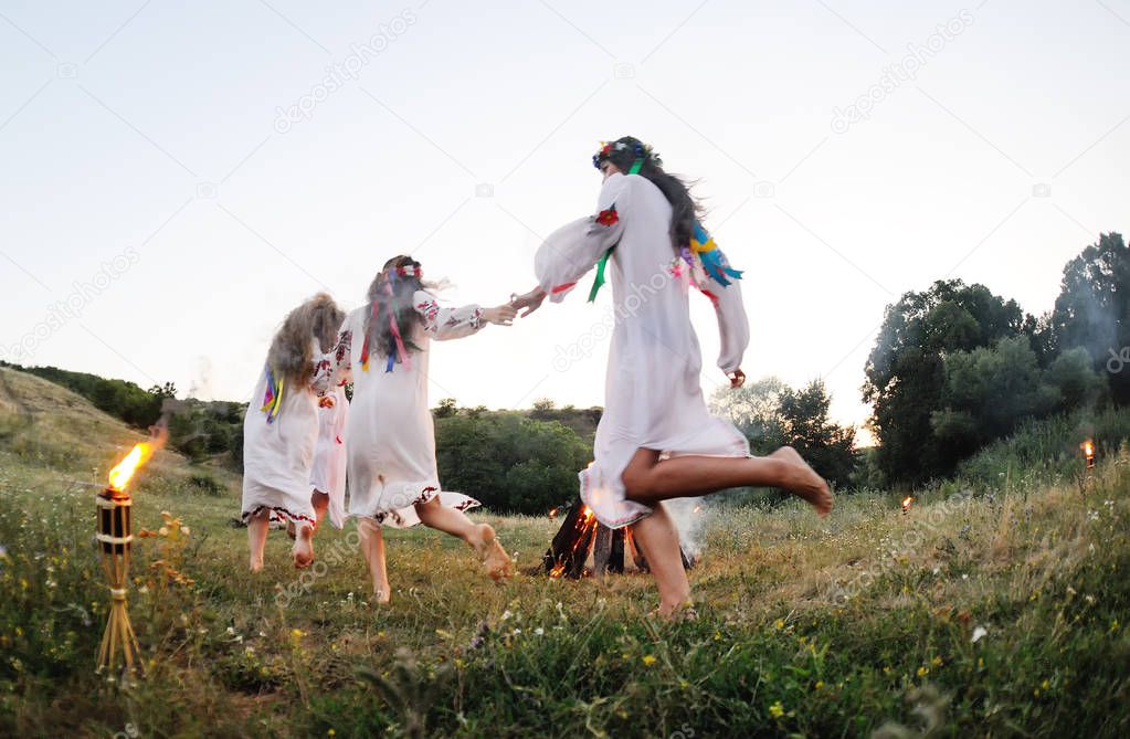 The celebration of the pagan Slavic holiday of Ivan Kupala Day or Midsummer.