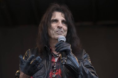 Napa, CA/USA: 5/26/19: Alice Cooper squeezes chickens to the crowd at BottleRock. He's known as 