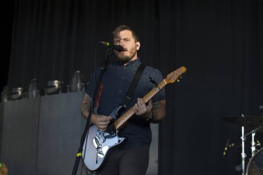 Concord, CA/USA: 7/6/17: Dustin Kensrue leads Thrice at Concord Pavilion. They're a rock band from Irvine, CA. In '16, they released their first post-reunion album, To Be Everywhere Is to Be Nowhere. The band's 10th album, Palms, was released in '18.