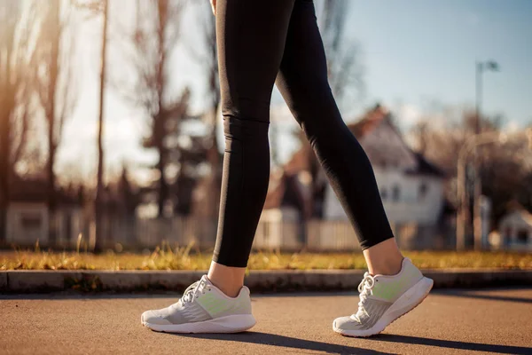 Close up, woman running outdoors. — Stock Photo, Image