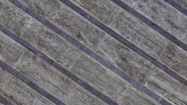 Arkaplan dokusu yüzeyi olarak gri tuğlalar.