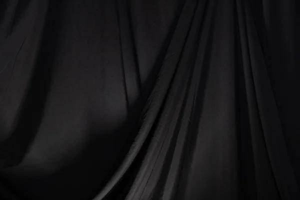 Ola de cortina negra con iluminación de estudio — Foto de Stock