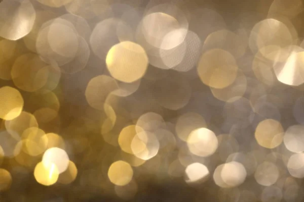 Abstrato fundo Bokeh dourado com brilho faíscas defocus — Fotografia de Stock