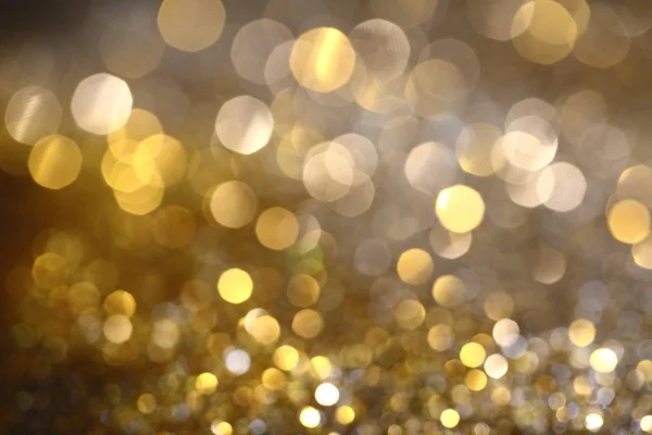Abstract Golden Bokeh background with shining defocus sparkles — Stock Photo, Image