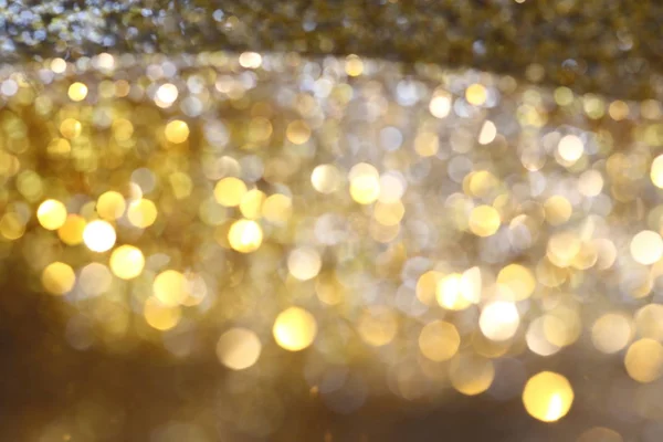 Abstract Golden Bokeh background with shining defocus sparkles — Stock Photo, Image