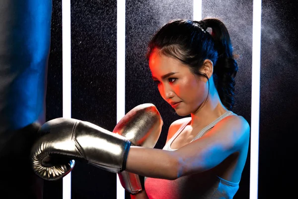 Girl exercises in Modern Neon Boxing Gym heavily — Stock Photo, Image