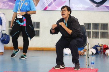 Bangkok, Thailand - June 30, 2018 : Coach shout and tell how to fight to Taekwondo Athlete in fighting match of The 4th HEROES Taekwondo International Championship at AU Stadium