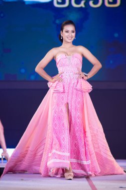 Udonthani, Thailand - July 23, 2019 ; Miss Thailand 2019 Udonthani, Beautiful Contestants present fashion show on stage with evening gown Colorful Dress Costume at Montatip Hall
