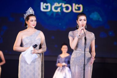 Udonthani, Thailand - July 23, 2019 ; Miss Thailand 2019 Udonthani, Beautiful Contestants answer Interview session to judge on stage with evening gown Colorful at Montatip Hall