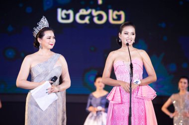 Udonthani, Thailand - July 23, 2019 ; Miss Thailand 2019 Udonthani, Beautiful Contestants answer Interview session to judge on stage with evening gown Colorful at Montatip Hall