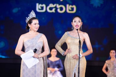 Udonthani, Thailand - July 23, 2019 ; Miss Thailand 2019 Udonthani, Beautiful Contestants answer Interview session to judge on stage with evening gown Colorful at Montatip Hall