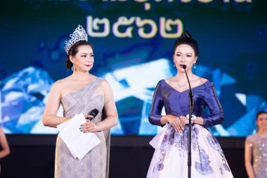 Udonthani, Thailand - July 23, 2019 ; Miss Thailand 2019 Udonthani, Beautiful Contestants answer Interview session to judge on stage with evening gown Colorful at Montatip Hall