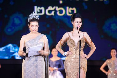 Udonthani, Thailand - July 23, 2019 ; Miss Thailand 2019 Udonthani, Beautiful Contestants answer Interview session to judge on stage with evening gown Colorful at Montatip Hall