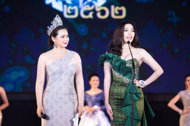 Udonthani, Thailand - July 23, 2019 ; Miss Thailand 2019 Udonthani, Beautiful Contestants answer Interview session to judge on stage with evening gown Colorful at Montatip Hall