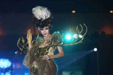 Bangkok, Thailand - May 24, 2017 ;  Lifeford Enchanted Princess Bridal Makeup 2017, Final Round at Bangkok Convention Hall, competition of creative hair style fashion show