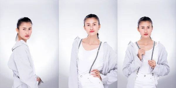 时尚年轻瘦小的亚洲女人包装的学院群包装的头发 穿着白色衬衫夹子吊带衫 看起来很有魅力 工作室照明白色背景隔离的复制空间 — 图库照片