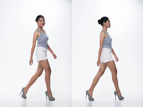 20年代时尚界年轻瘦小的亚洲女人淡褐色皮肤秀丽的秀发构成了时尚灰色的白色短裤造型 工作室照明白色隔离背景 拼贴组包装步行高跟鞋 — 图库照片