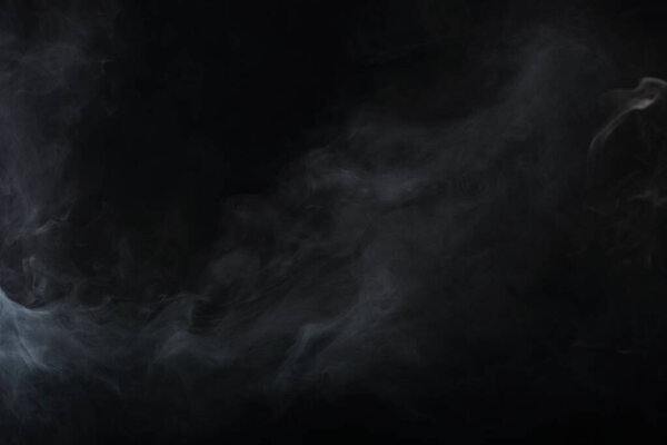 Dense Fluffy Puffs of White Smoke and Fog on Black Background, Abstract Smoke Clouds, Movement Blurred out of focus