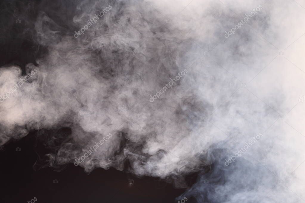 Dense Fluffy Puffs of White Smoke and Fog on Black Background, Abstract Smoke Clouds, All Movement Blurred, intention out of focus, and high low exposure contrast, copy space for text logo