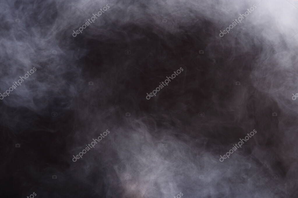 Dense Fluffy Puffs of White Smoke and Fog on Black Background, Abstract Smoke Clouds, All Movement Blurred, intention out of focus, and high low exposure contrast, copy space for text logo