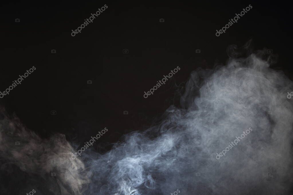 Dense Fluffy Puffs of White Smoke and Fog on Black Background, Abstract Smoke Clouds, All Movement Blurred, intention out of focus, and high low exposure contrast, copy space for text logo