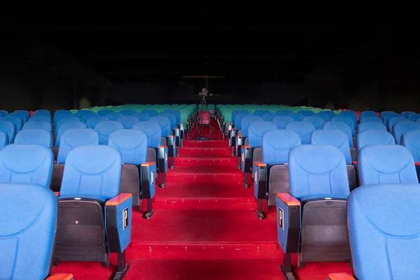 Blue Velvet Fabric Cloth Empty Many Seats Row Column in Movie film Theatre Concert or Siminar Conference premiere room