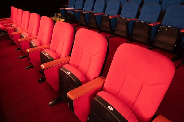 Red Velvet Fabric Cloth Empty Many Seats Row Column in Movie Theatre Concert or Siminar Conference room