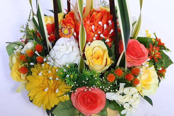 Bouquet of Purple many kind of flower on roman column jar Artificial , studio lighting white background