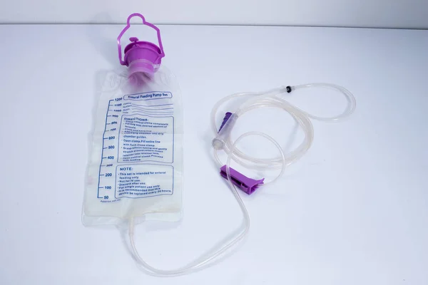 Feeding Pump medical device purple color to supplement nutrition liquid food to tube Enteral feeding fluid set bag with clamp, single use only