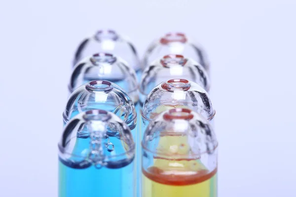 Blue Yellow Liquid Group Glass Tube Red Cap Lab Test — Stock Photo, Image