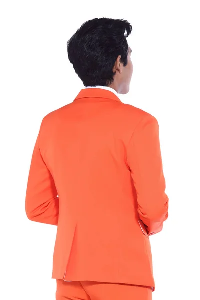 Orange Suit Businessman standing with back to the camera or from behind, black pant white shirt, isolated on studio lighting white background