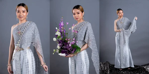 ブルーシルバータイの伝統衣装や東南アジアの金のドレスアジアの女性で装飾の花の肖像画を多くのポーズでスタジオ照明グレーの背景 コラージュグループパックの下に保持 — ストック写真
