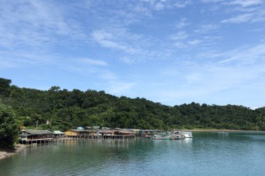 Trat, Thailand - July 3, 2017 ; View from Ferry Carry car vehicles acroos Thai Bay to Koh Chang Island in beautiful sunshine day green ocean