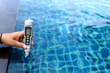 Resort Private pool has weekly check maintenance test, Salt Meter Level, to make sure water is clean and can swim clipart
