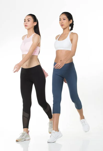 Dois Asiático Tan Skin Fitness Mulheres Exercício Desgaste Rosa Azul — Fotografia de Stock