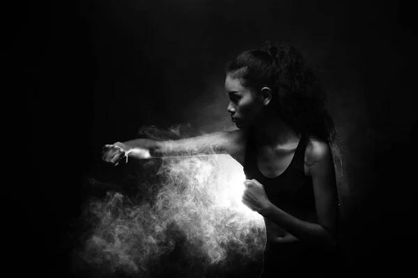 Asian Tan Skin Fitness Girl Exercxing Punch Fog Smoke Dark — стокове фото