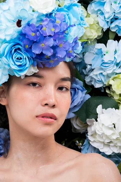 Wreath of flowers background in Rose Blue sky fresh smell good Spring Summer for Beautiful Asian Woman portrait, Studio Lighting Campaign for Perfume, Cosmetic, Lipstick concept ads