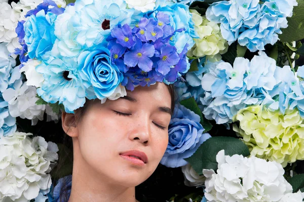 Wreath of flowers background in Rose Blue sky fresh smell good Spring Summer for Beautiful Asian Woman portrait, Studio Lighting Campaign for Perfume, Cosmetic, Lipstick concept ads