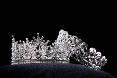 Diamond Silver Crown for Miss Pageant Beauty Contest, Crystal Tiara jewelry decorated gems stone and abstract dark background on black velvet fabric cloth, Macro photography copy space for text logo