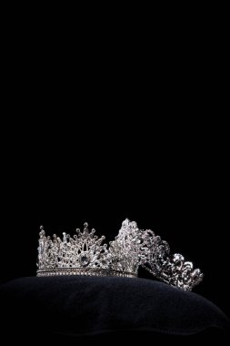 Diamond Silver Crown for Miss Pageant Beauty Contest, Crystal Tiara jewelry decorated gems stone and abstract dark background on black velvet fabric cloth, Macro photography copy space for text logo