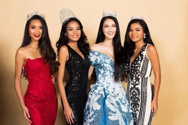 Group of Four Miss Beauty Pageant Queen Contest in Asian Evening Ball Gown sequin dress with Diamond Crown Sash, multi national race world beauty contest, chit chat talk smile laugh for winner